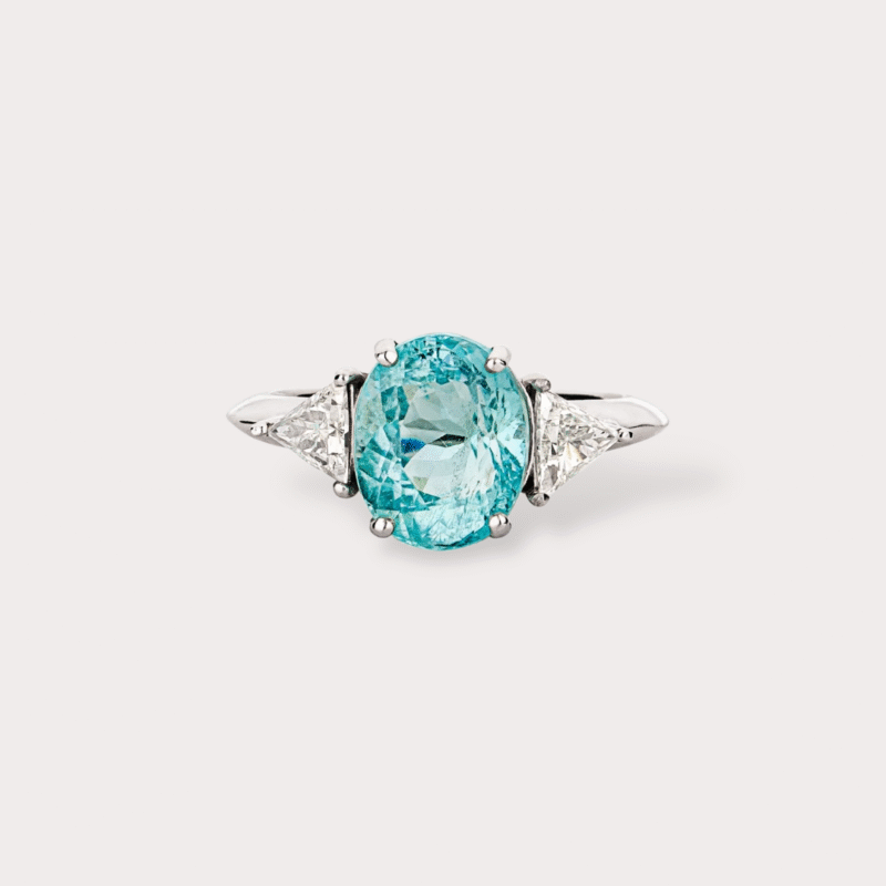 Anel em ouro branco 18k com 0,44ct em 2 diamantes e 3,76ct em 1 turmalina paraíba